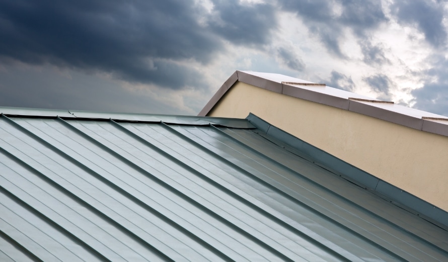 Picture of a green standing seam metal roof.
